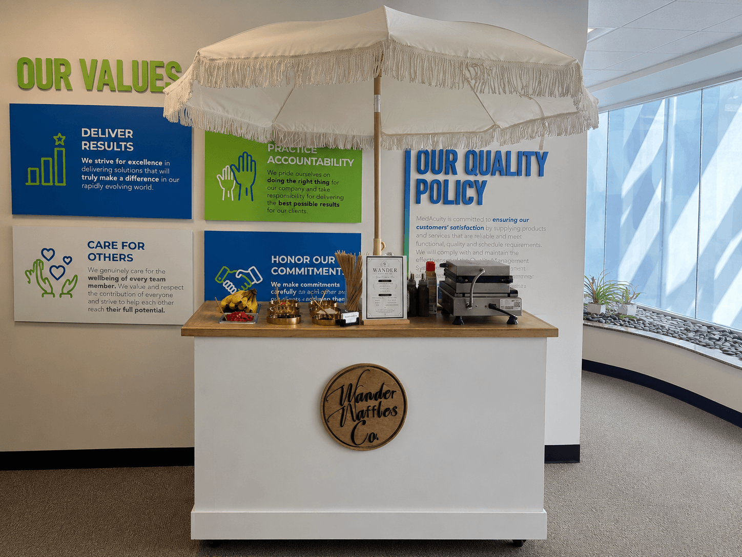 Wander Waffles CO cart set up inside a Cambridge corporate office for a team event