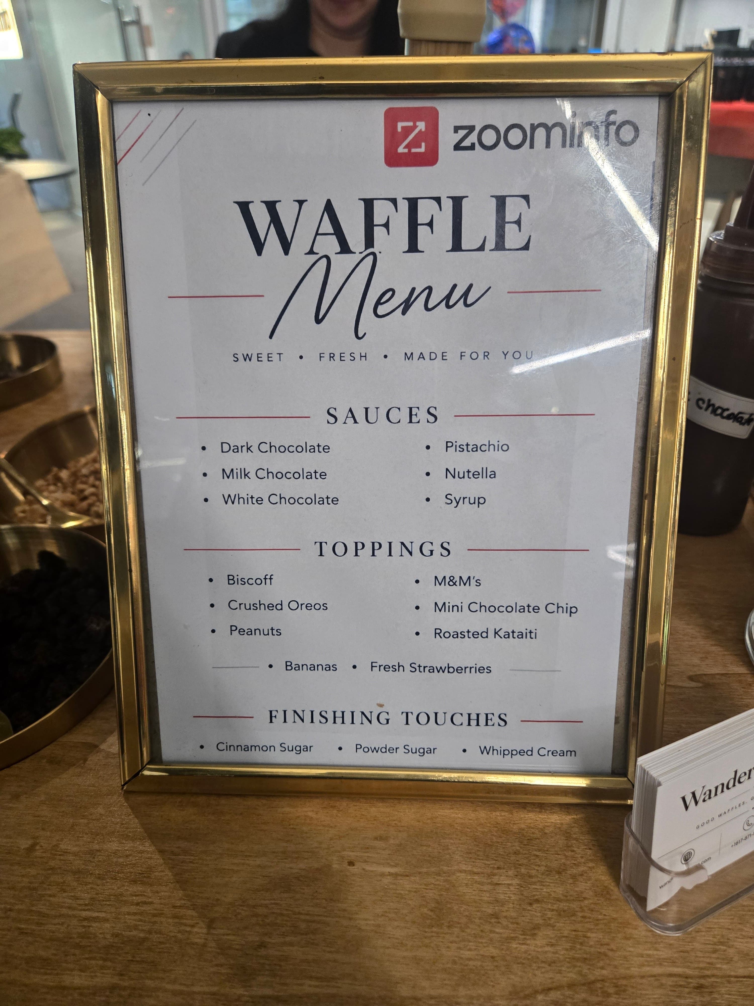 Wander Waffles CO made-to-order waffle catering menu at a Zoominfo corporate event in Waltham, MA.